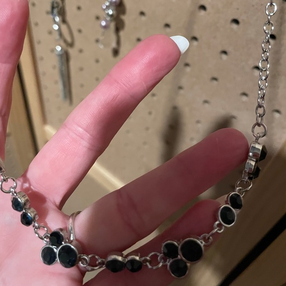 Short silver necklace with Mickey Mouse shape design clusters. - Picture 3 of 4